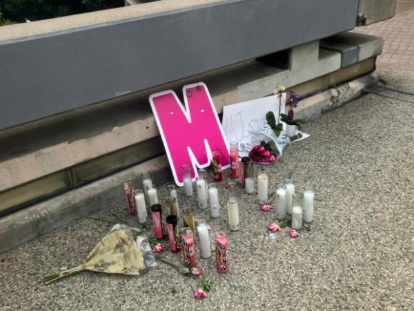 A street-side memorial for Maleesa Mooney, who was killed in her apartment, is displayed on Sept. 20, 2023, in downtown Los Angeles. On Wednesday, Feb. 21, 2024, a 41-year-old Minnesota man was arrested in co<em></em>nnection with the September killing of Mooney, a model who was beaten, bound and stuffed inside the refrigerator of her downtown Los Angeles apartment, police say. (John Antczak/AP)