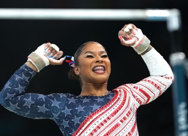 Jordan Chiles celebrates after the uneven bars in the team final on July 30, 2024.