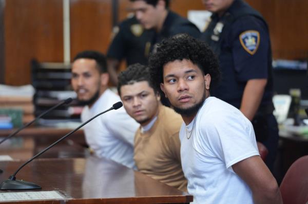 Five migrants have been charged with assaulting two police officers in Times Square on January 27, 2024. The defendants are in court as the two sides try to work out a disposition. Here, pictured, from left to right:  Marce Estee, Wilson Juarez and Yorman Reveron. 